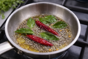 Separate small pan, heat ghee or oil
